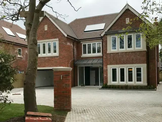Large brick house showcasing new build construction